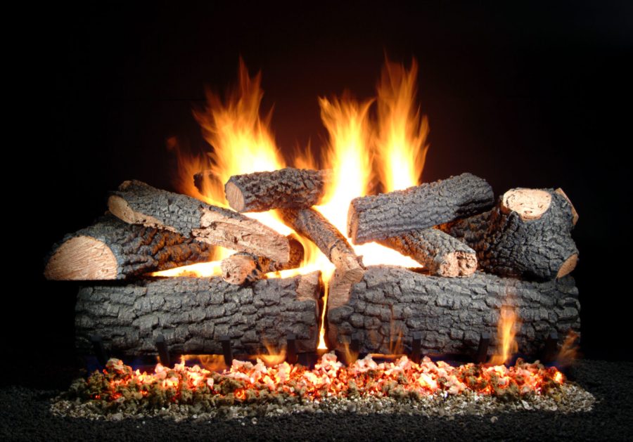 Gas vented log set with large fire going