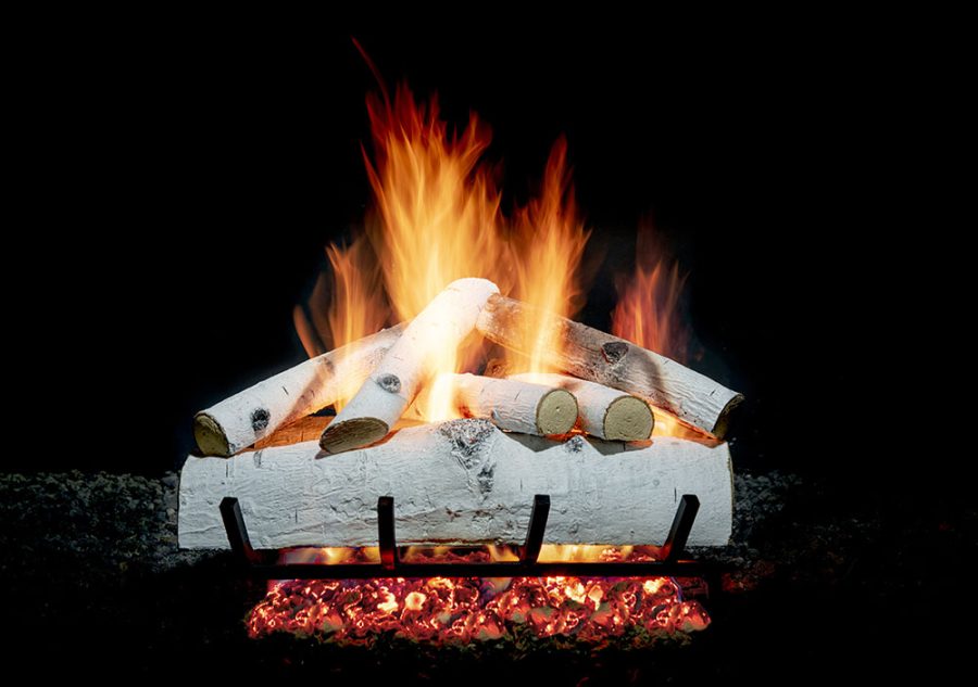 Birch wood fireplace set with fire