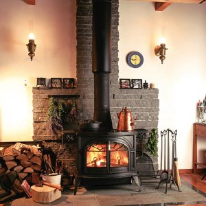 Wood stove in a cozy living room in a cabin