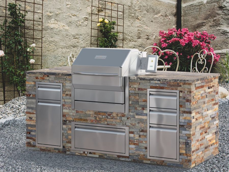 Life shot of a stone grill table with a built in grill