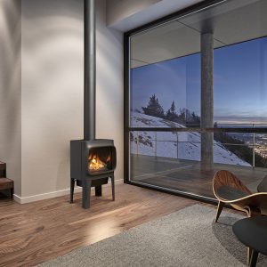 Black gas stove next to a large window over looking a large city