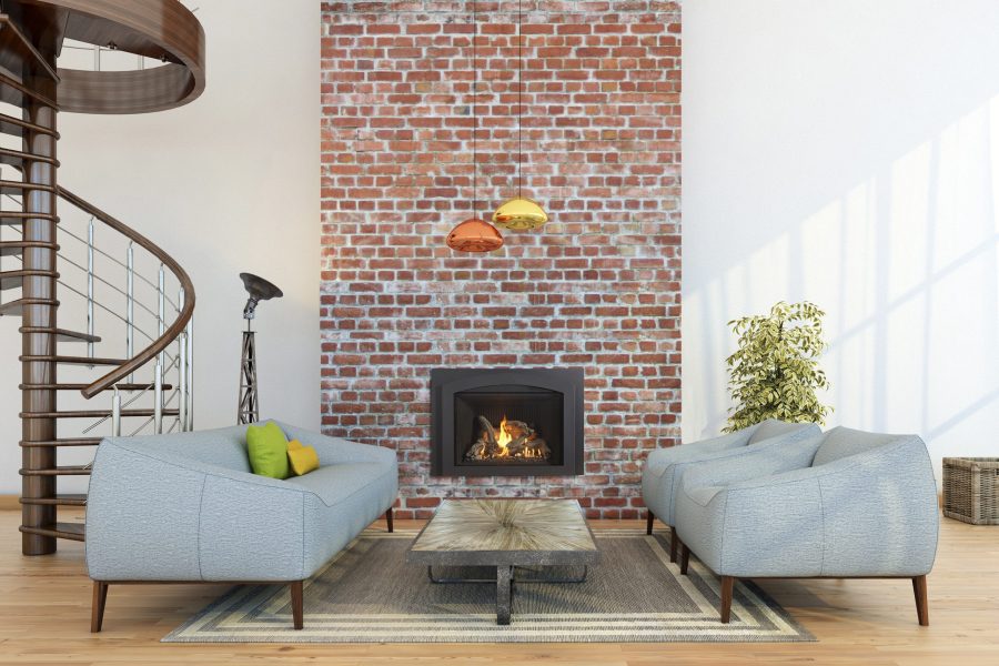 Gas fireplace insert built into a red brick wall with two seats and a small spiral staircase