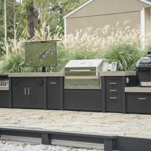 Outdoor kitchen next to a home