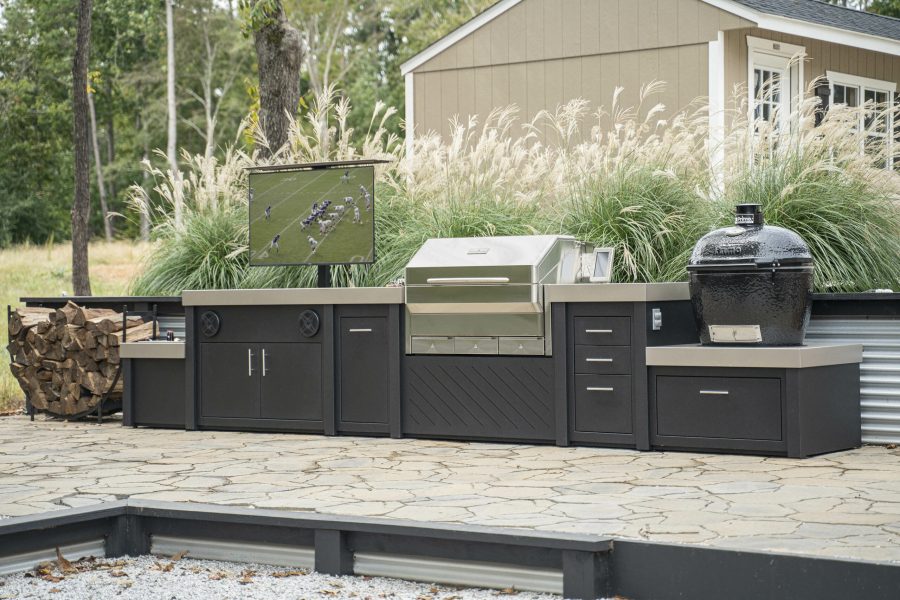 Outdoor kitchen next to a home