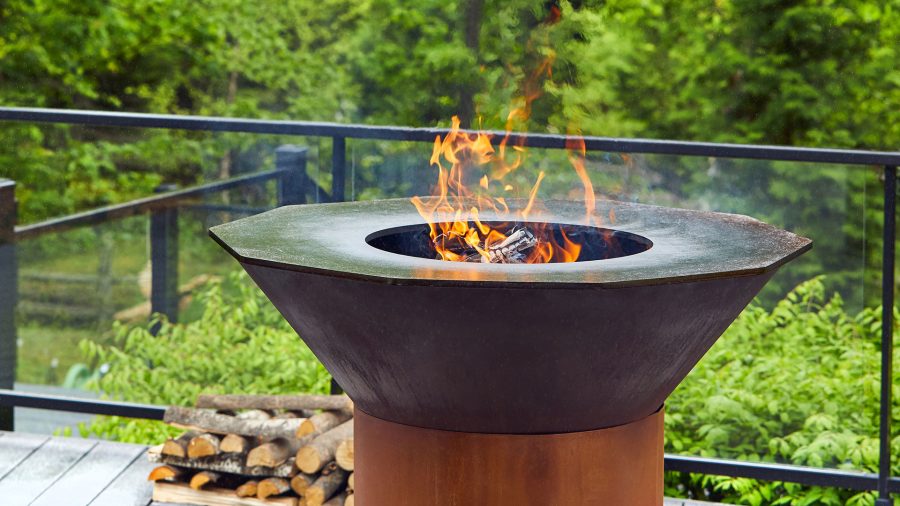 Outdoor grill fireplace with wood buring