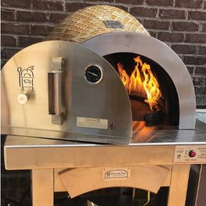 A pizza oven with a fire going on inside