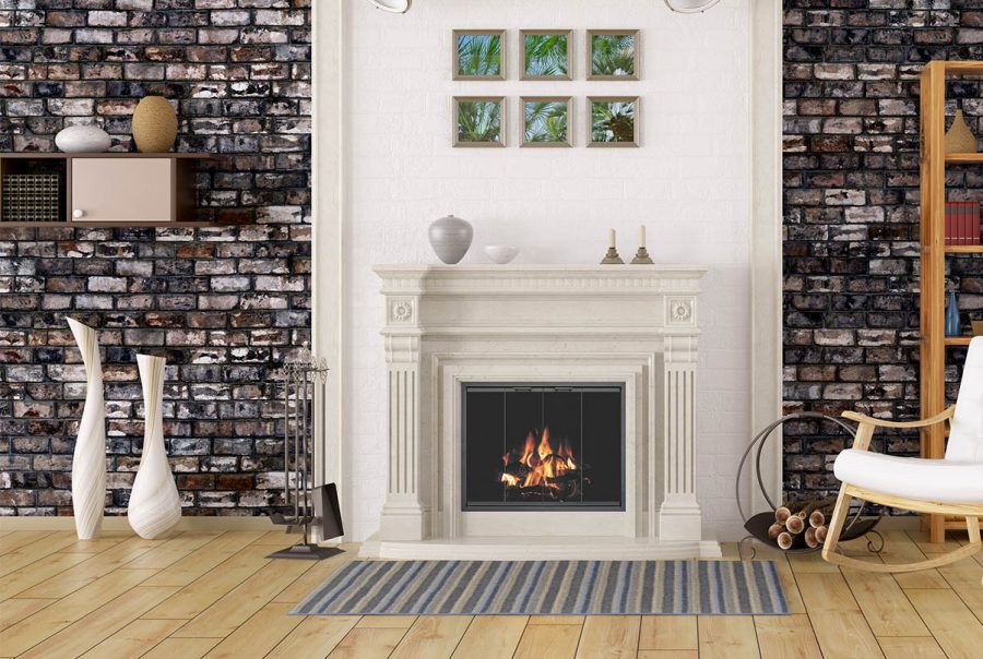 Fireplace with white surround built in a brick wall in a living room