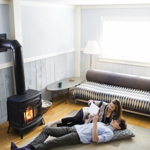 Gas stove in a living room with a small family