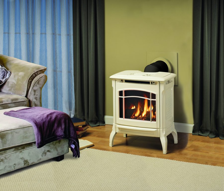 White small gas stove in a living room with drapes and windows