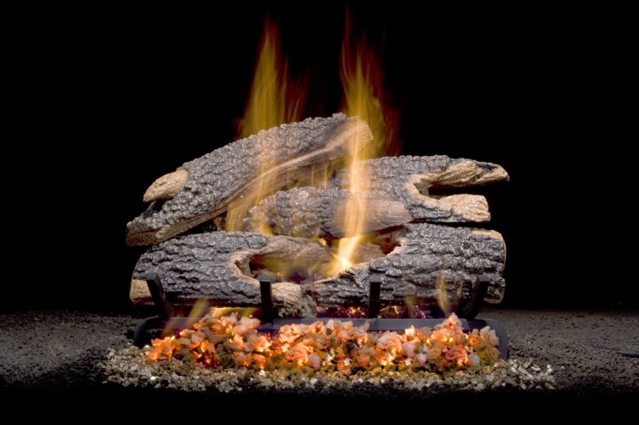 Fireplace logs with vented fire coming through