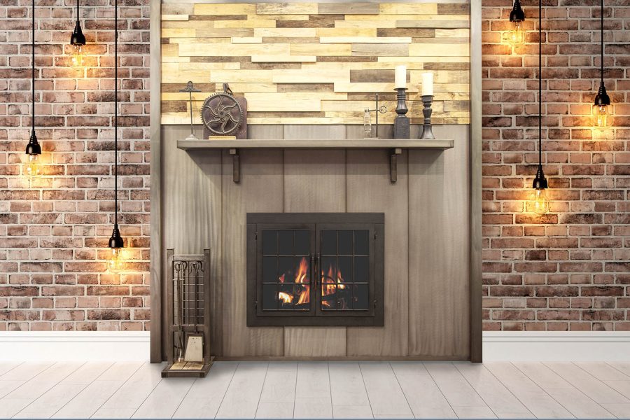 Brick wall with a fireplace built into it with shiny gold steel above it