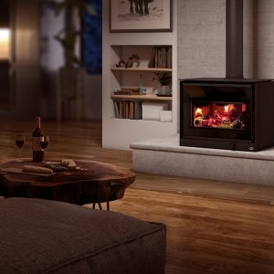 Wood stove in dimly lit living room with a warm fire going