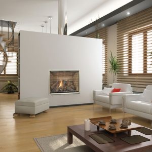 Large living room with a wall going through the middle with a fireplace embedded in it