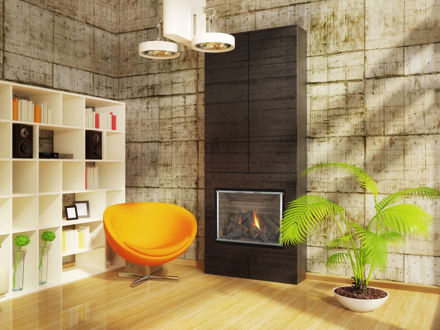 Small room with an orange chair and a fireplace